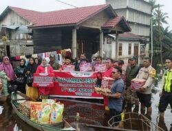 Sinergi Polsek Kerumutan dan PT. EMP Energi Riau Salurkan Bantuan bagi Korban Banjir