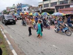 Pastikan Aman, Polsek Pangkalan Kerinci Gelar Pengamanan Pasar Tumpah Selama Bulan Ramadhan 1446 H